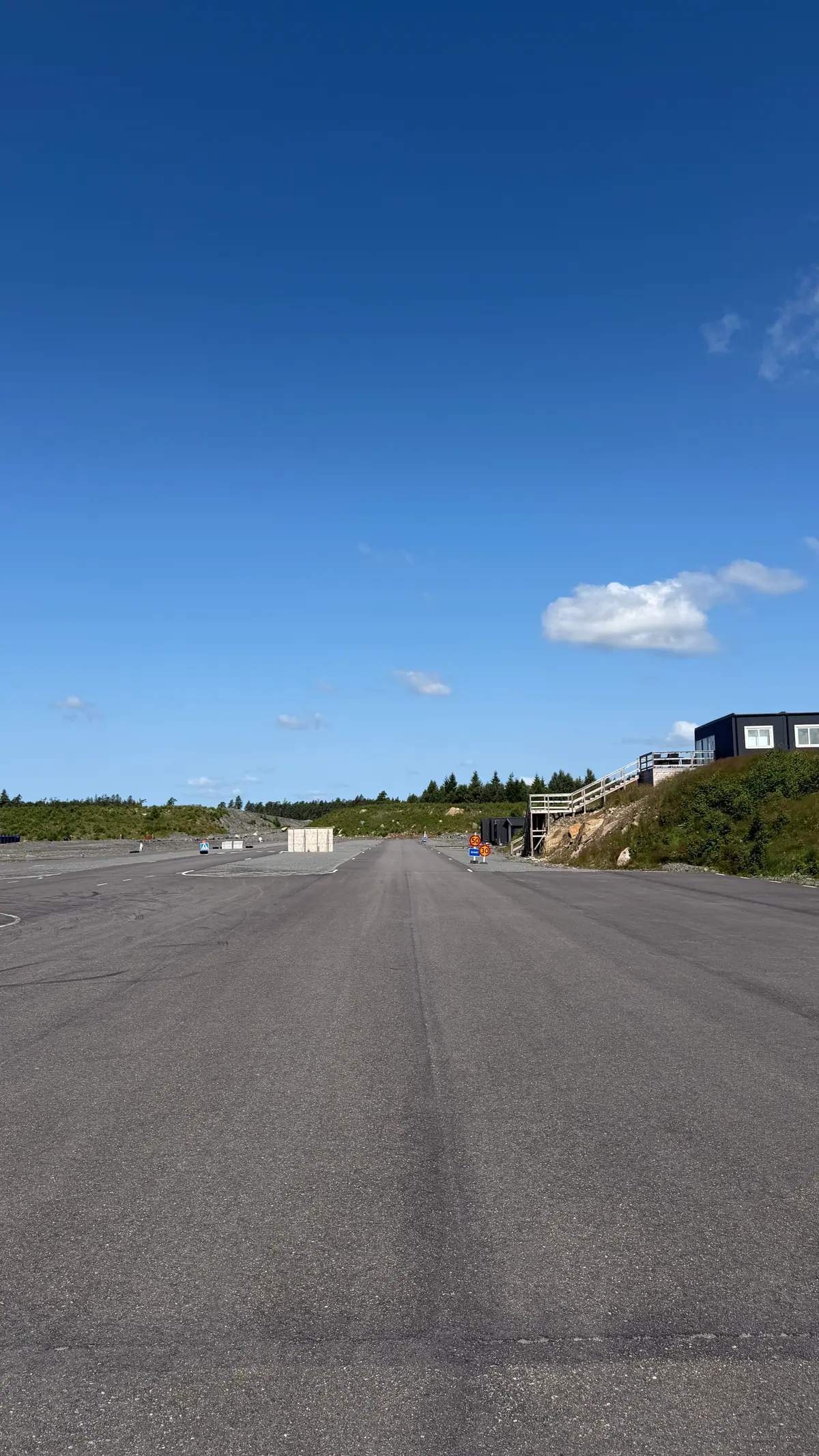 The track towards the stand and the building