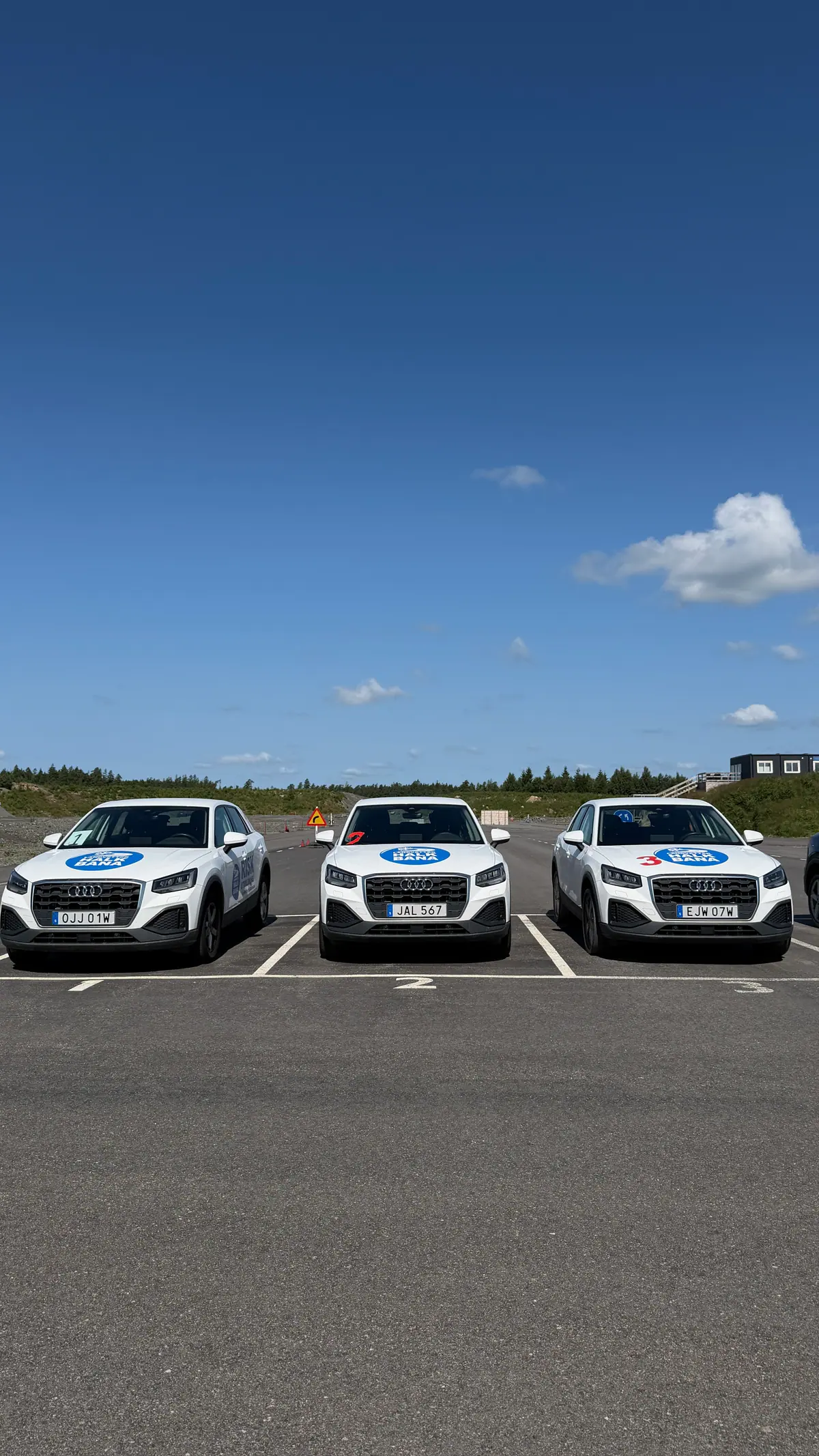 Three white training cars at Landvetter Halkbana